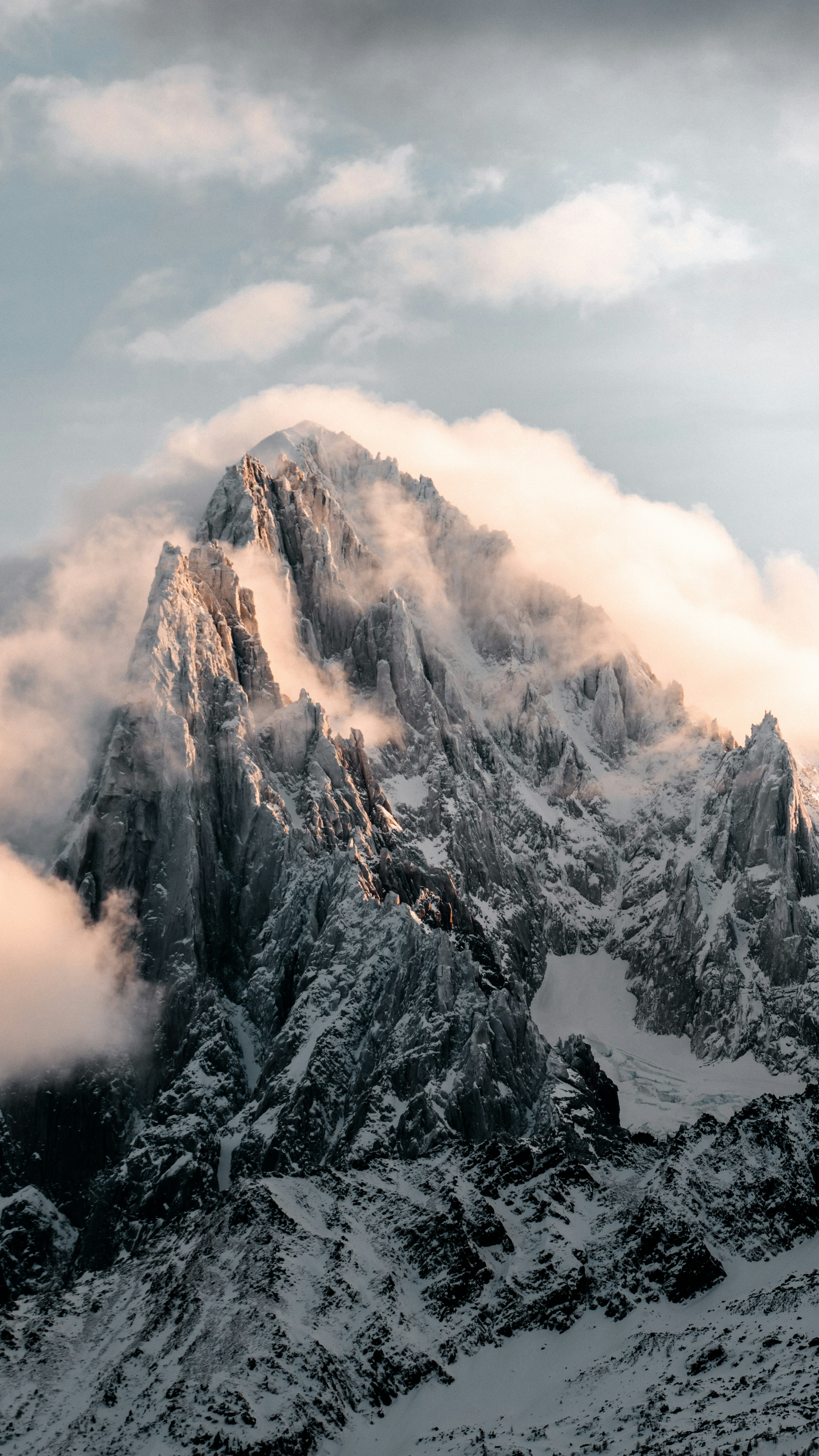 snow covered mountain during daytime